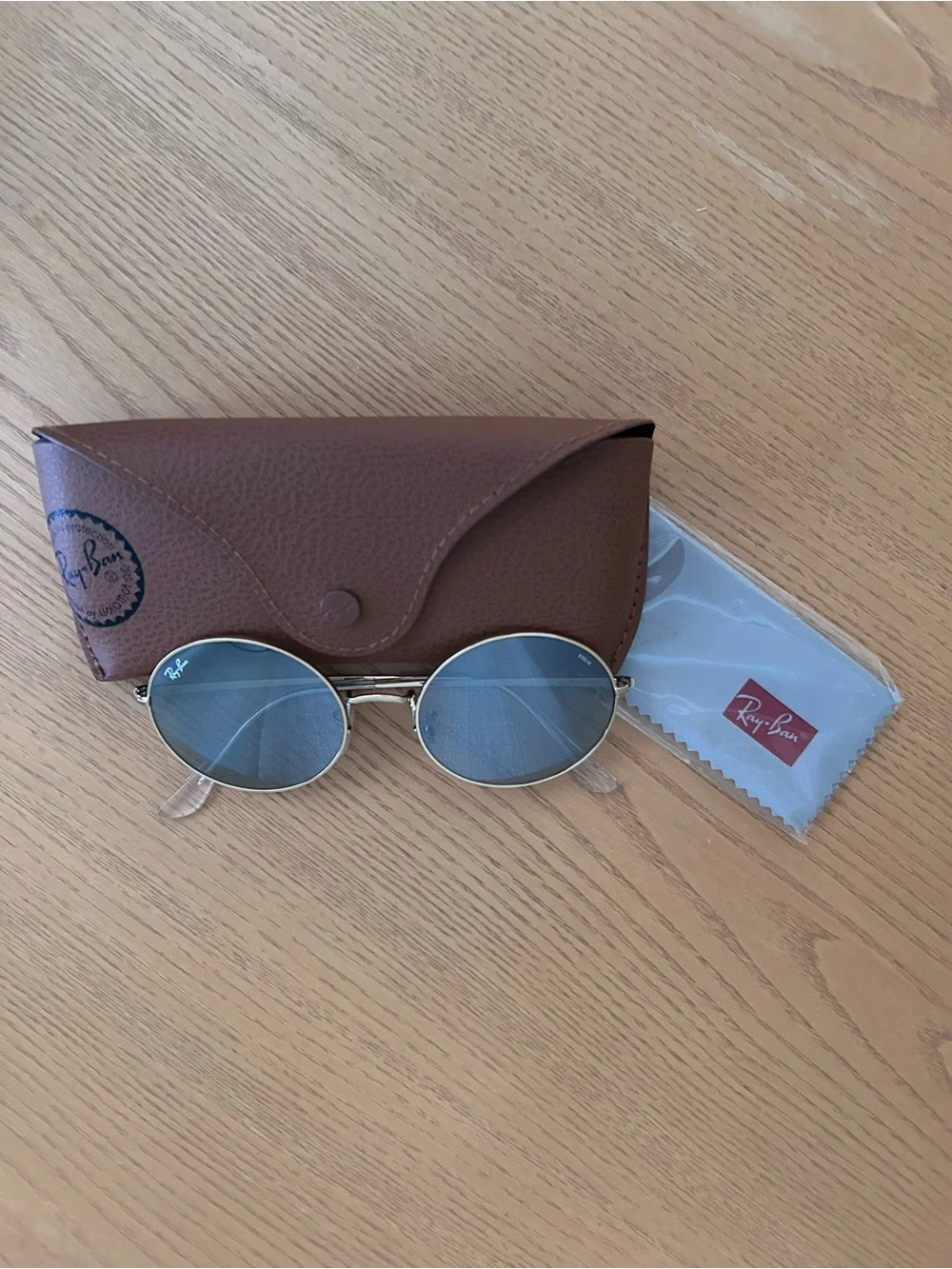 Ray-Ban 1970 Oval Metal Sunglasses Gold Frame with Blue Gradient Lenses